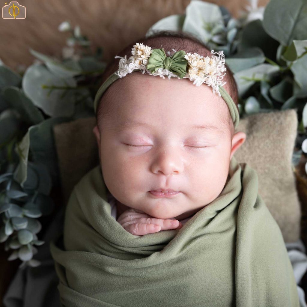 babies around 7-14 days are wrapped and posed