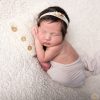 sleeping newborn baby wrapped in cream blanket chieu lee photography chantilly